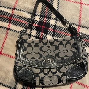Older style Coach purse in excellent condition.